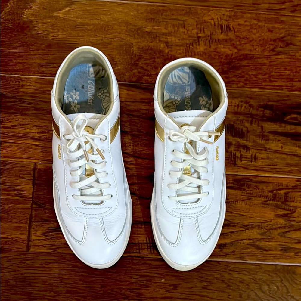 OluKai White and Gold Women's Sneakers